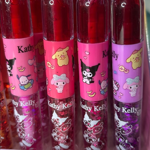 Other - Lip tint and lip gloss. One of each side. Set of 4